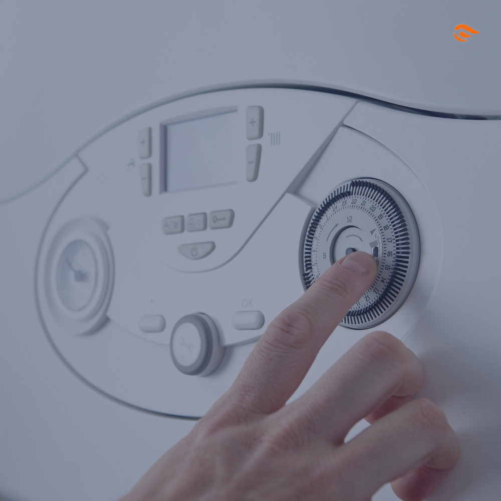 Persona ajustando caldera Persona ajustando caldera